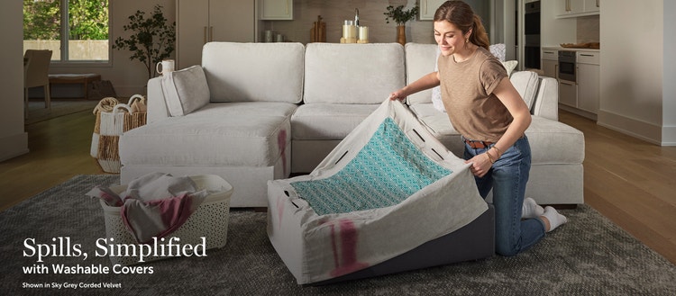 Woman removing her Lovesac sectional couch covers