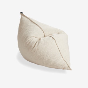 A Lovesac PillowSac bean bag chair in Cloud Bouclé fabric.